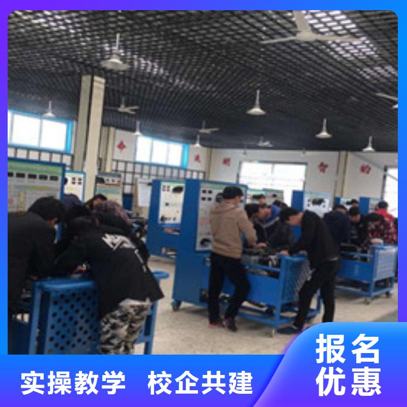 哪里能学汽车维修技术学修车一年学费多少钱虎振汽修专业学校